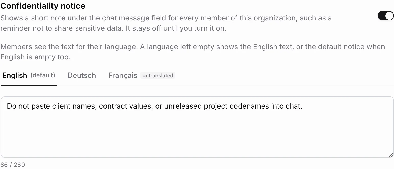 The Confidentiality notice section with its switch on and the English tab selected, asking members not to paste client names, contract values, or unreleased project codenames into chat; the Français tab is marked untranslated.