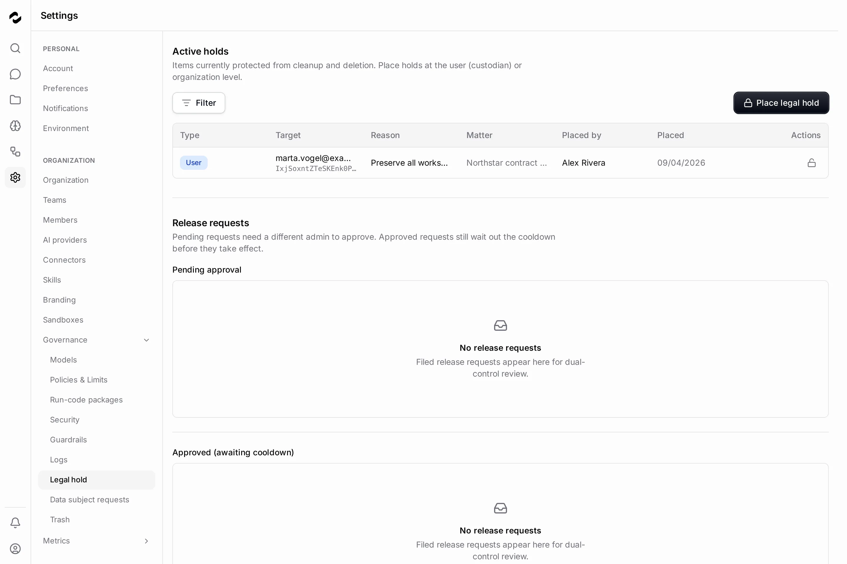 The Legal hold governance page showing one active hold — a User hold on marta.vogel, placed by Alex Rivera under the Northstar contract matter — beside a Place legal hold button, above the Pending approval and Approved release-request queues, both reading No release requests.